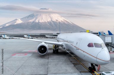 Airplaine passenger stop on run way of Heneda international airport with Fuji mountain background, Tokyo city, Japan